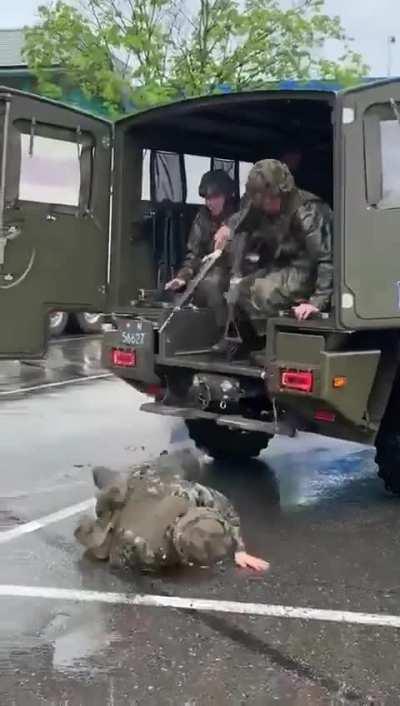 Falling out of a Swiss military vehicle in the rain