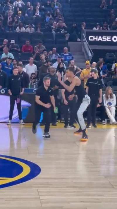 7’4” NBA rookie Victor Wembanyama with an 8’ wingspan warming up with his trainer