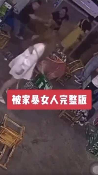 Man attacks woman with a chair while “friends” stand there and do nothing