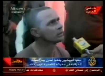 US soldiers captured, interrogated and humiliated on Iraqi television after being stopped and destroyed by Iraqi forces while marching in the city of Nasiriyah on 23. March, 2003. Sources reported that more than 100 US soldiers were killed in that confron