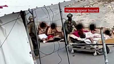 Verified footage from BBC news showing medical staff stripped to their underwear and on their knees during IDF's raid of Nasser Hospital in Gaza, patients on hospital beds appearing to have their hands being bound