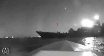 UA pov: Moment a Ukrainian drone boat hit a Russian ship, allegedly. 