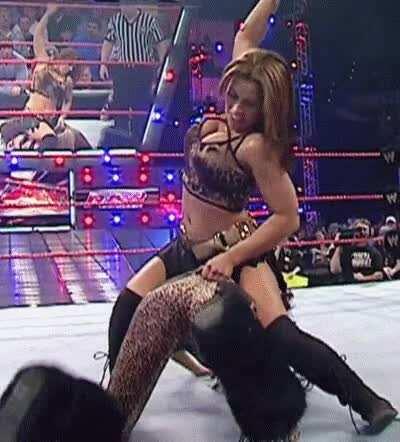 Melina rode and spanked by Mickie