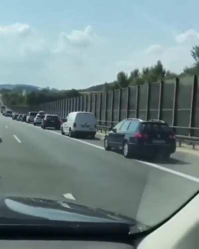 A law in Germany requires all drives on highways to line up to the far side of their lanes during heavy traffic so that emergency vehicles can pass them more easily to reach the scenes of accidents