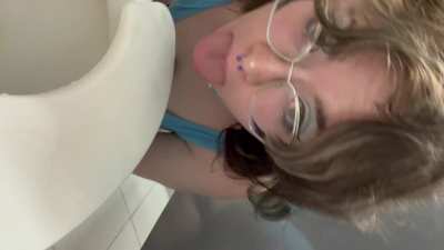 Cleaning my mess off the toilet seat in a public bathroom 