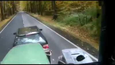 The dude brake checks a tractor and gets rear ended.