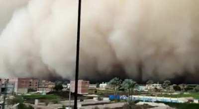 A massive sandstorm is approaching one of Egypt villages right now