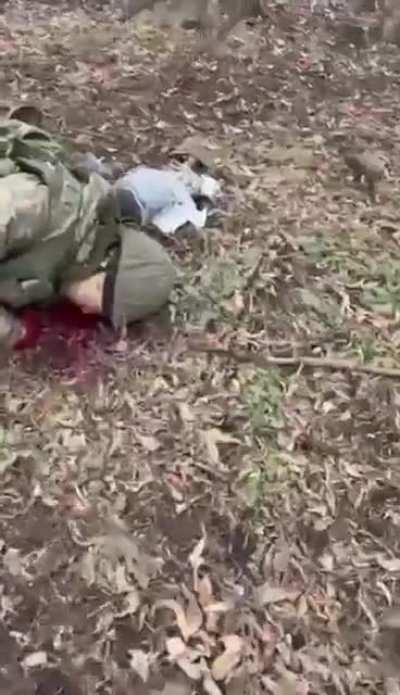 Invaders who came to Ukraine and died for nothing. The last soldier has a grenade in his hand.