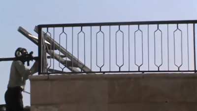 FSA (Northern Storm Brigade) fighter uses an RPG-7 to harass a Syrian Army position in the Bustan Al-Basha neighborhood, Aleppo Governorate, November 2012