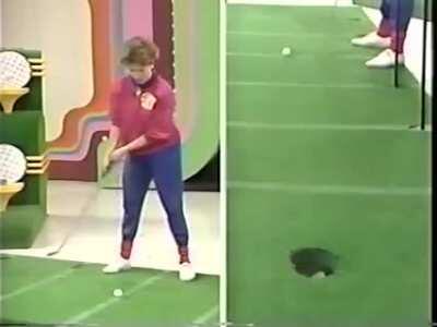 An engineer getting the ball into the hole on a gameshow