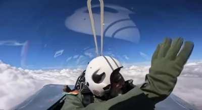 who tf is he waving at above the clouds?