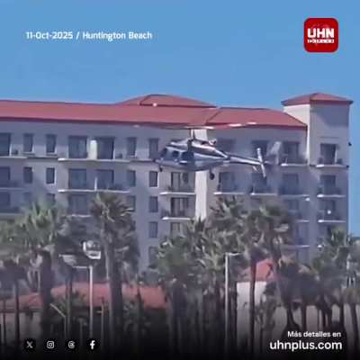 A helicopter crashes in Huntington Beach, south of Los Angeles, California.