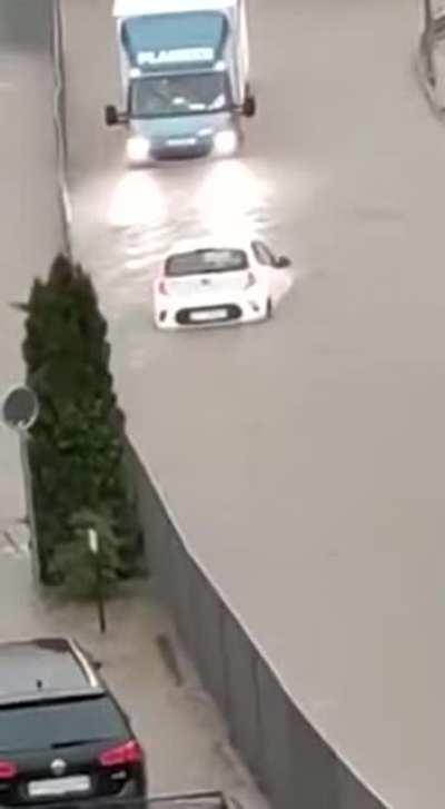 Driver turns their car into a boat, then back into a car