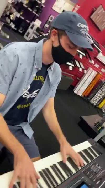 Cyran Plays Every Hit Song On Piano in Guitar Center
