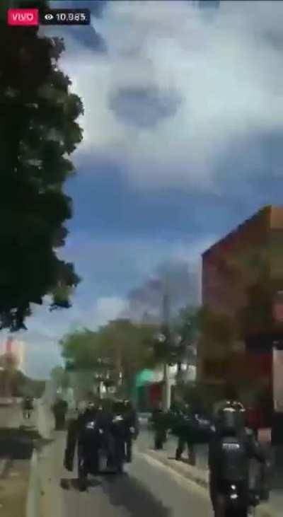 Colombian Police kept hitting unconscious dying young guy with water untill they killed him.