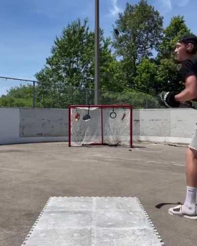 Hold his redbull while he bounces pucks