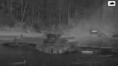 Military Tank jumping across a river