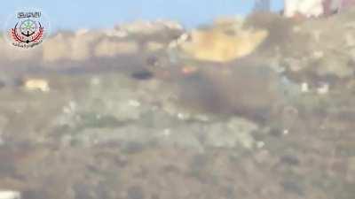 FSA 1st Coastal Division BGM-71 TOW team times their shot with the emergence of an SAA tank to fire, but it appears to be a potential dud - Latakia - 2/5/2015