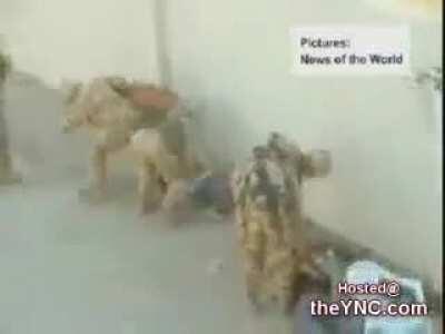 POS Cameraman getting pleasure out of Iraqi Kids getting beaten by British Army.