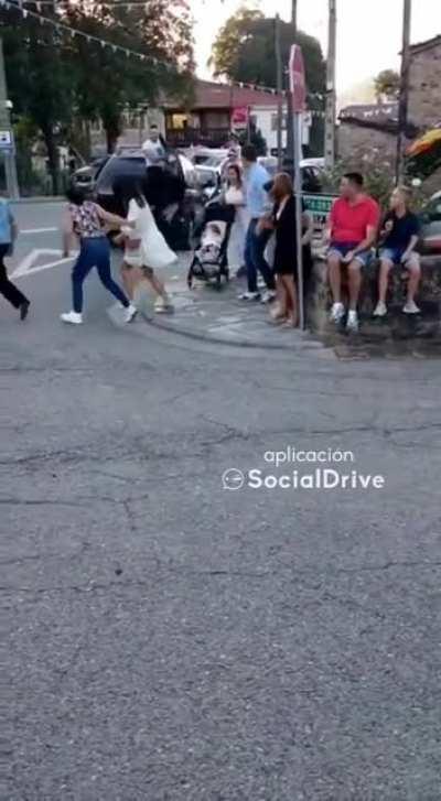 Lady is run over by donkey on a street race.