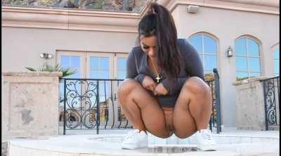 Peeing Brunette