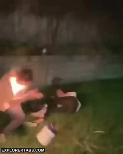 Spitting accelerant point blank into a fire