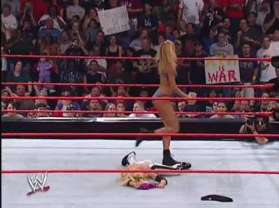 Trish Stratus vs. Stacy Keibler in a Bra And Panties Paddle On A Pole Match