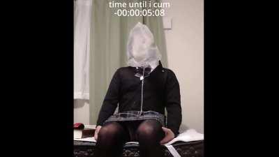 Bagged crossdresser has HFO in flat chastity cage