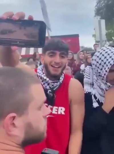 Muslims show the bodies of Israeli civilians massacred by Hamas Islamic terrorists while laughing hysterically. 