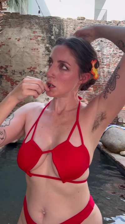 Putting my hair up at the pool