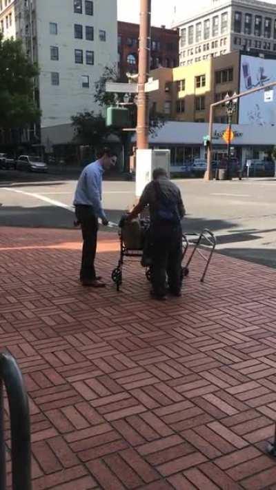 Businessman buys homeless man new walker