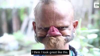 Man licks his own forehead