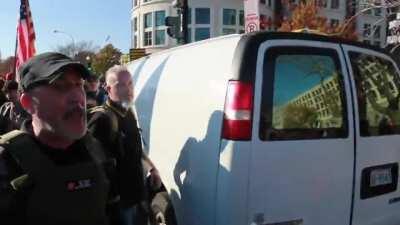 Proud Boys attack a member of the media during the Million MAGA March