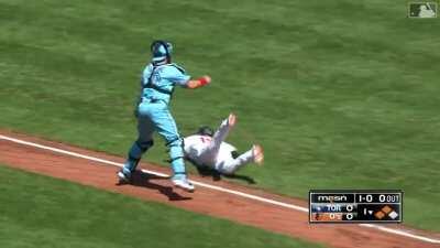 Travis Shaw fields a sharp grounder to third and delivers a strong throw to the plate to nab Chance Sisco in the 1st inning