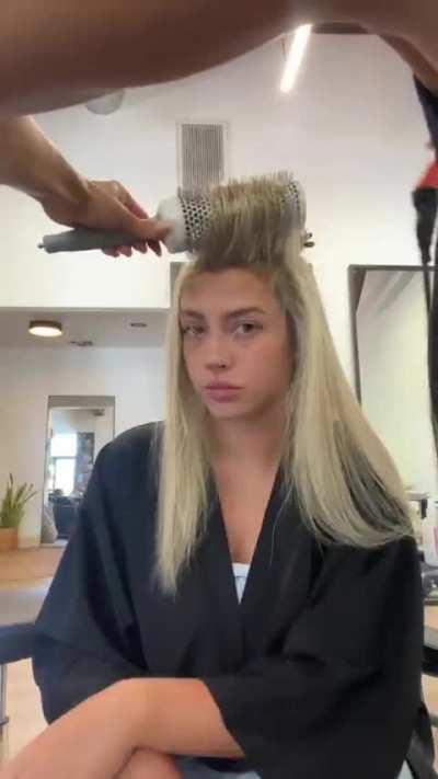 Getting her hair done