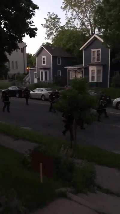 Please make this go viral. I am begging you. Police and National Guard patrolling neighborhood and shooting civilians on their own property. Make America see this, I beg you. [Minneapolis]