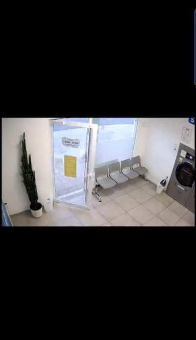 Washing machine explodes seconds after man exits.