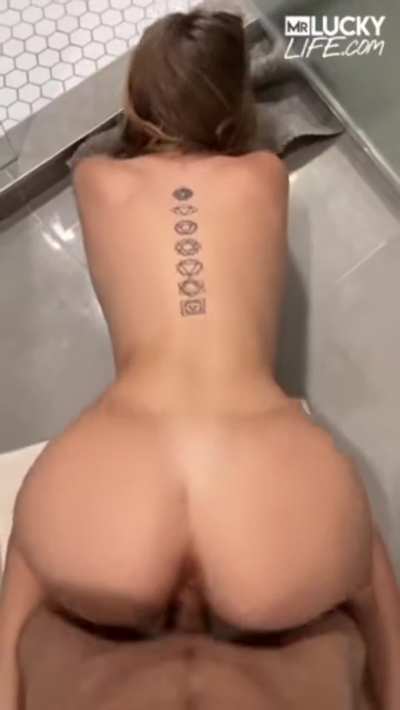 Angel taking it in the shower