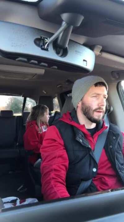 Listening to a song with cussing with your daughter