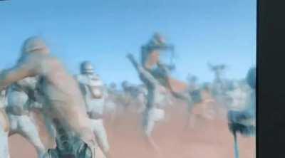 One of the Fremen in the background takes down their enemy in the most disrespectful way possible