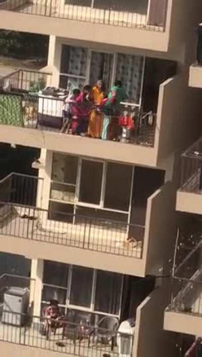 Using a cloth rope for picking a kid from the floor below in a high rise