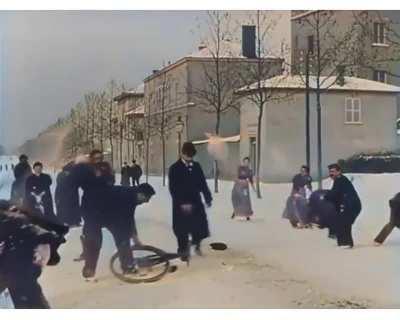 Snowball fight from 125 years ago (1897) in Lyon, France That has been colorized and speed adjusted.