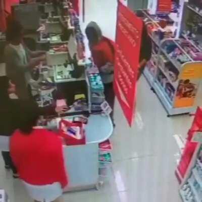 Thief pretending to be armed surrenders to employee pretending to be armed.