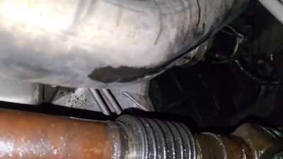 4 hours into a trip i pull into a rest stop and see this, how screwed am i??? What could have caused this?? Any help would really go along way (1985 6.2 w\h built 4L60E)