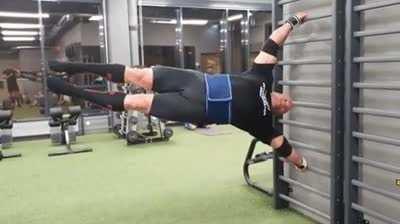 Strongman Rauno Heinla doing the human flagpole weighing 138kgs (304lbs)