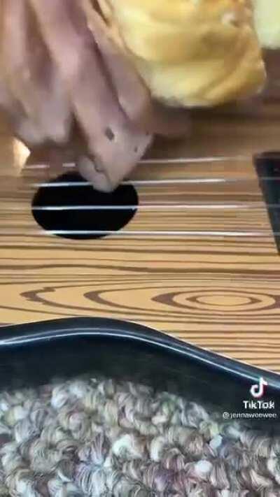 Cursed_Roast_Beef_Ukelele (Is it a ukelele? In pretty sure it is)