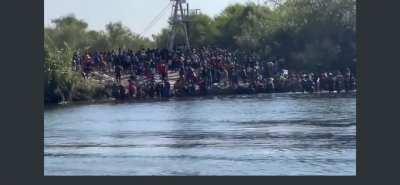 Constant flow of migrants crossing the Rio Grande river in hopes of getting into the US