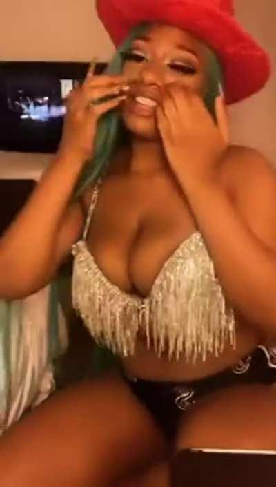 Megan Thee Stallion riding an imaginary cock