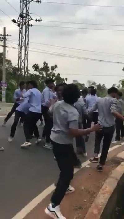 Fight between two different college students in Kerala, India.