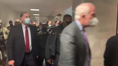 Heavy law enforcement detail escorting senators to the Capitol, the joint session is expected to resume at 8pm